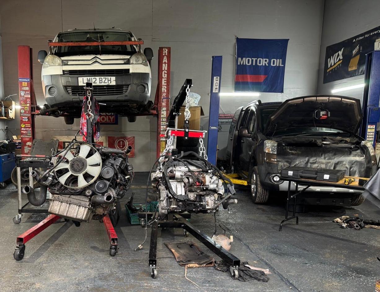 LPA Motor Services workshop with engines on stands